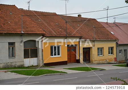Traditional family house in a village or suburb in the Czech Republic - Europe. 124573918