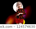 A woman with short hair wearing a hat and red outfit 124574630