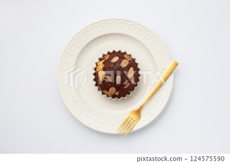 Chocolate cupcakes on a white background 124575590