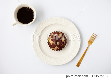 Chocolate cupcake and coffee on a white background 124575592