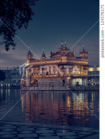 Golden temple in Amritsar city at night, India 124576175
