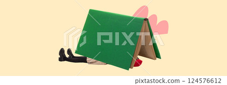 Conceptual art collage. Girl under giant open green book like a tent, symbolizing immersive reading and safe space in learning. 124576612