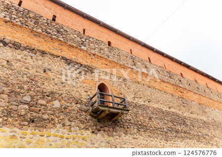 brick wall of an old castle with toilet room brick wall of an old castle with toilet room 124576776