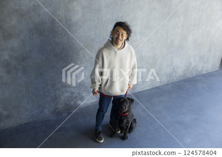 Man training a dog Man training a dog 124578404