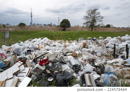 Scenery of a mountain of illegally dumped garbage Scenery of a mountain of illegally dumped garbage 124578484