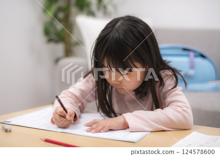 Children working on their homework 124578600