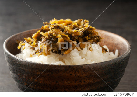 Rice topped with mustard greens Rice topped with mustard greens 124579967