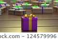 Purple Gift Box with Yellow Bow on Wooden Background. 124579996