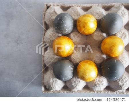 Bright Eggs laid out on a tray 124580471
