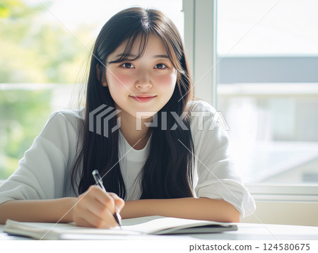 female student studying hard 124580675