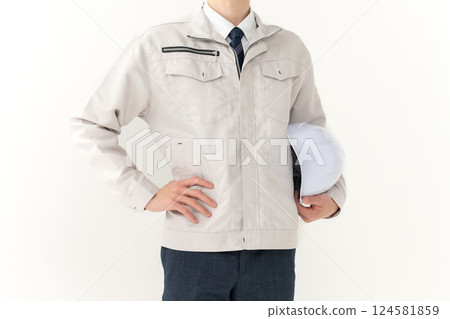 Young man in work clothes, hands Young man in work clothes, hands 124581859