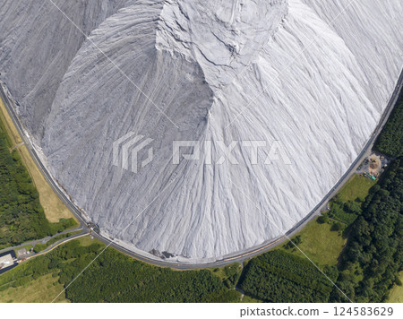 White Slagheap, Waste Heap in Germany - Monte Kali - Salt Mountain in Heringen, Germany. 124583629