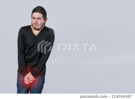 Medical problem, urinary incontinence concept. young man with crotch pain, man with diarrhea problem 124584387