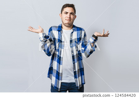 Man spreading palms, feeling clueless and uncertain. Person with puzzled gesture spreading hands, Concept of a puzzled man spreading hands isolated. Guy with puzzled gesture spreading palms Man spreading palms, feeling clueless and uncertain. Person with puzzled gesture spreading hands, Concept of a puzzled man spreading hands isolated. Guy with puzzled gesture spreading palms 124584420