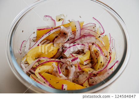 Red onion and yellow pepper slapper - a prepared dish 124584847