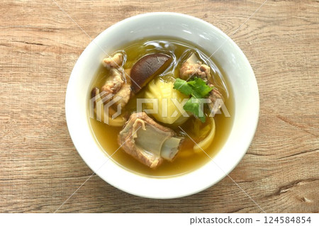 boiled pickled cabbage with pork bone and black mushroom in clear soup on bowl boiled pickled cabbage with pork bone and black mushroom in clear soup on bowl 124584854