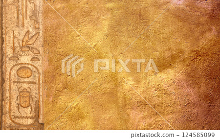 Horizontal background with ancient Egyptian hieroglyphs on stone wall, Egypt, Africa. Backdrop with sandstone carving with hieroglyph. Mock up template. Copy space for text 124585099