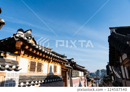 View of Bukchon Hanok Village, near Anguk Station, spring blue sky, Seoul, Korea View of Bukchon Hanok Village, near Anguk Station, spring blue sky, Seoul, Korea 124587540