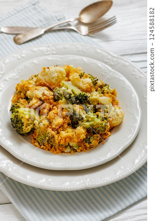broccoli cauliflower casserole on plate, top view broccoli cauliflower casserole on plate, top view 124588182