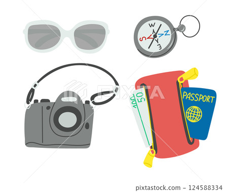 Travel essentials including sunglasses, a compass 124588334