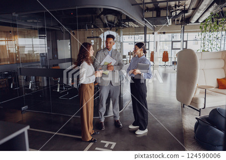 Engaging in a collaborative meeting in a modern office that inspires success and creativity 124590006