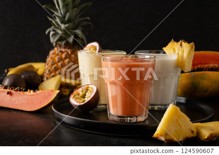 Vegan Asian pineapple and papaya smoothie or lassi. 124590607