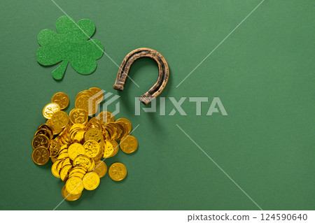 St. Patrick's day composition with clover leaf, horseshoe on green. St. Patrick's day composition with clover leaf, horseshoe on green. 124590640
