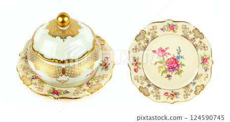 Vintage porcelain candy bowls on a beautiful plate and a vintage porcelain plate isolated on white background. 124590745