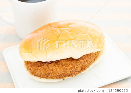 Delicious croquette bread and coffee for breakfast Delicious croquette bread and coffee for breakfast 124590953