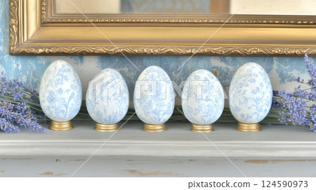 Unique Easter centerpiece featuring vintage decorations and intricately designed Easter eggs arranged elegantly with lavender, creating a charming Provenal spring ambiance 124590973