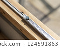 Carpenter doing interior construction work 124591863