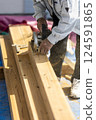 Carpenter doing interior construction work 124591865