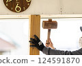 Carpenter doing interior construction work 124591870