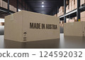 Boxes with MADE IN AUSTRIA text on conveyor. 3d illustration 124592032