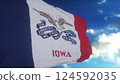 Iowa flag on a flagpole waving in the wind in the sky. State of Iowa in The United States of America. 3d illustration 124592035
