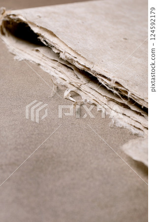 Textured Handmade Paper Edge Closeup 124592179