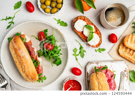 Assorted delicious baguette sandwiches Assorted delicious baguette sandwiches 124593444
