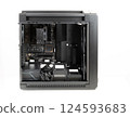 Side view  big tower, PC case, chassis,  inside motherboard, CPU, fan, SSD, memory, power supply unit with cables. 124593683