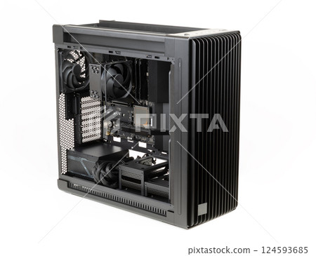 Side view big tower, PC case, chassis, inside motherboard, CPU, fan, SSD, memory, power supply unit with cables Side view big tower, PC case, chassis, inside motherboard, CPU, fan, SSD, memory, power supply unit with cables 124593685