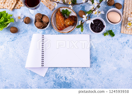 Traditional Passover Seder plate with symbolic foods. Symbolic of Jewish holiday Pesah. Traditional Passover Seder plate with symbolic foods. Symbolic of Jewish holiday Pesah. 124593938