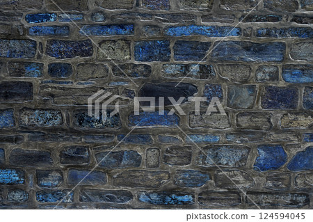 Patterned stone wall with textured blue and gray shades for backgrounds Patterned stone wall with textured blue and gray shades for backgrounds 124594045