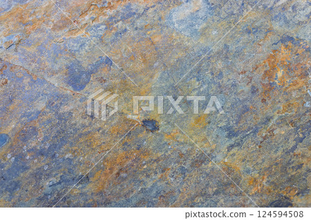 Natural multicolor stone texture background with weathered surface 124594508