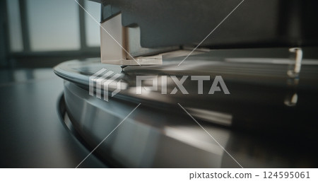 Stylus Needle Touching Grooves, Playing Sound on Vinyl Record Player Stylus Needle Touching Grooves, Playing Sound on Vinyl Record Player 124595061
