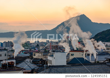 Beppu city morning glow and snowmobile 124595151