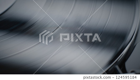 LP Vinyl Record Player: Macro Close Up of Vinyl Record Rotating, Playing Authentic Analog Sound LP Vinyl Record Player: Macro Close Up of Vinyl Record Rotating, Playing Authentic Analog Sound 124595184