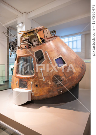 Explore the Apollo 10 command module, a vital part of space exploration history, showcased in the Science Museum, London. Visitors can view its intricate details and rich background. 124595472