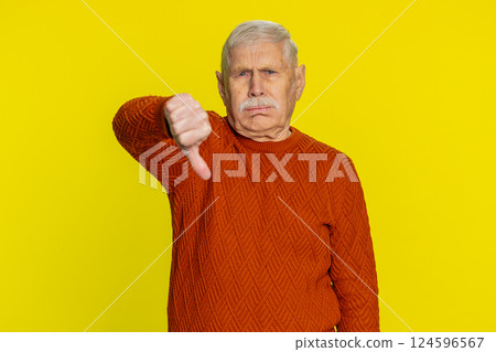 Upset grandfather man showing thumbs down gesture disapproval dissatisfied dislike negative feedback 124596567