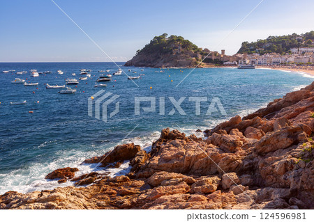 Sandy beach coastline in Tossa de Mar, Spain Sandy beach coastline in Tossa de Mar, Spain 124596981