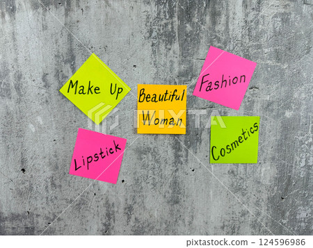 Multicolored sticky notes with beauty and fashion themed inscriptions. Reminder about cosmetology and makeup for beautiful woman. Applying makeup for attractive girl Multicolored sticky notes with beauty and fashion themed inscriptions. Reminder about cosmetology and makeup for beautiful woman. Applying makeup for attractive girl 124596986