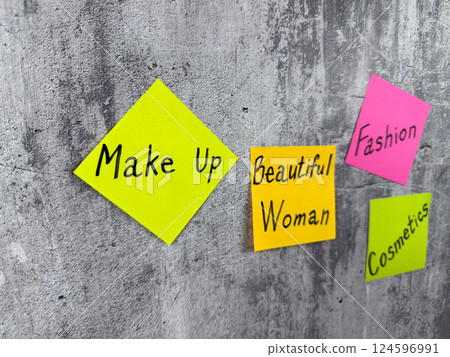 Sticker with the word make up. Simple design of complex concept about cosmetics and fashion industry. Human attractiveness and cosmetics for better appearance 124596991